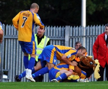The Players Go In For A Friendly Hug With Sammy The Stag! (Photo By Dan Westwell)